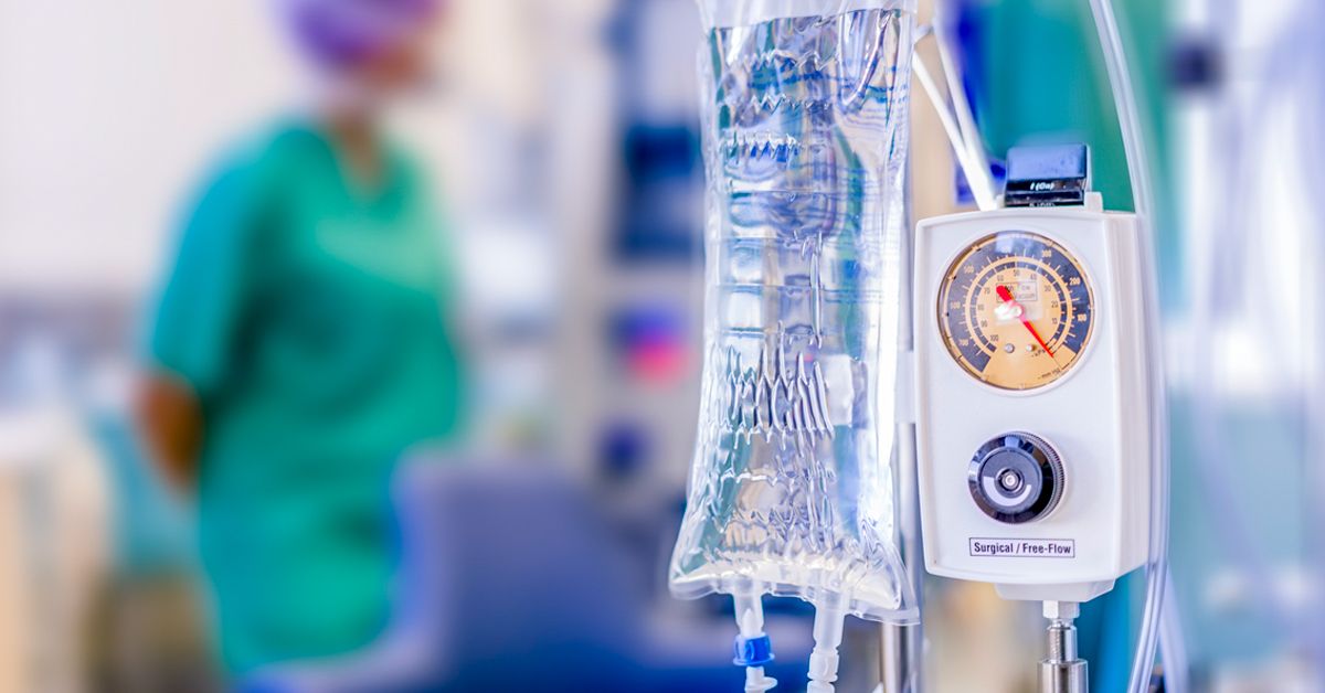 Hanging pillar and Saline solution fluid iv bag in emergency room at  hospital.right copy space Stock Photo