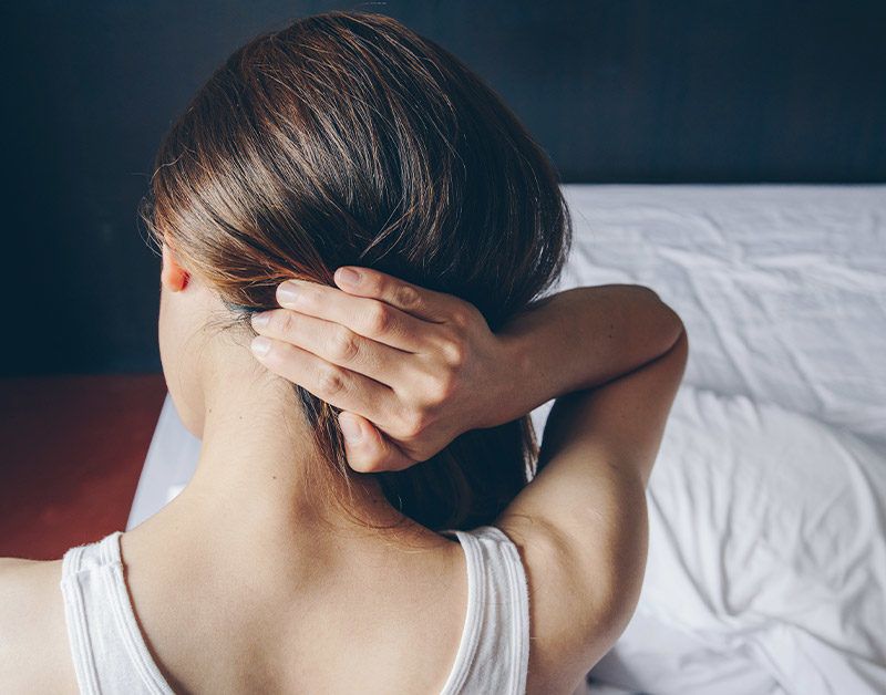 The 2 neck pain symptoms you need to get treated for right away
