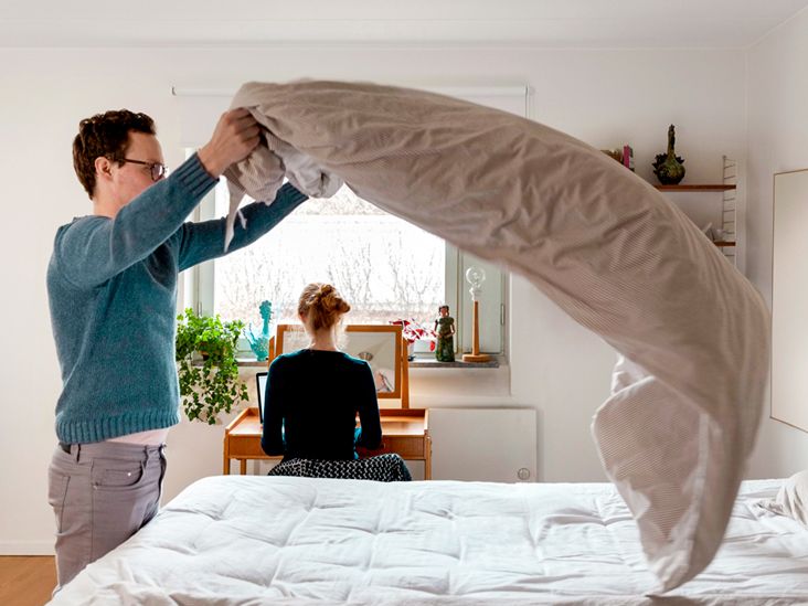 https://media.post.rvohealth.io/wp-content/uploads/2019/08/Man-making-bed-while-woman-working-at-table-in-bedroom-732x549-thumbnail.jpg