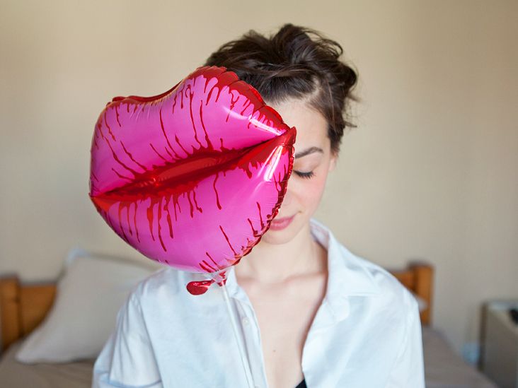 Young woman with lips shaped balloon 732x549 thumbnail