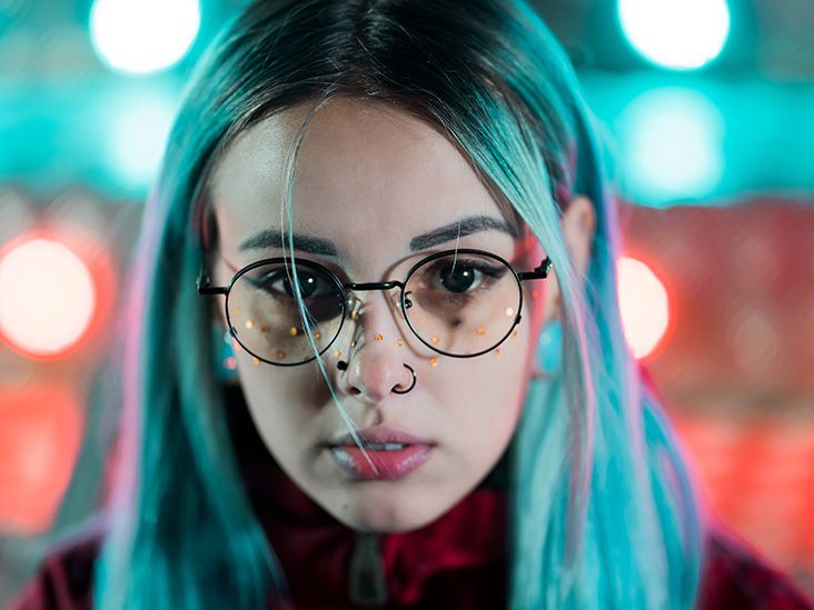 hipster girl with blue dyed hair and golden sequins as freckles woman with nose piercing transparent 732x549 Thumbnail