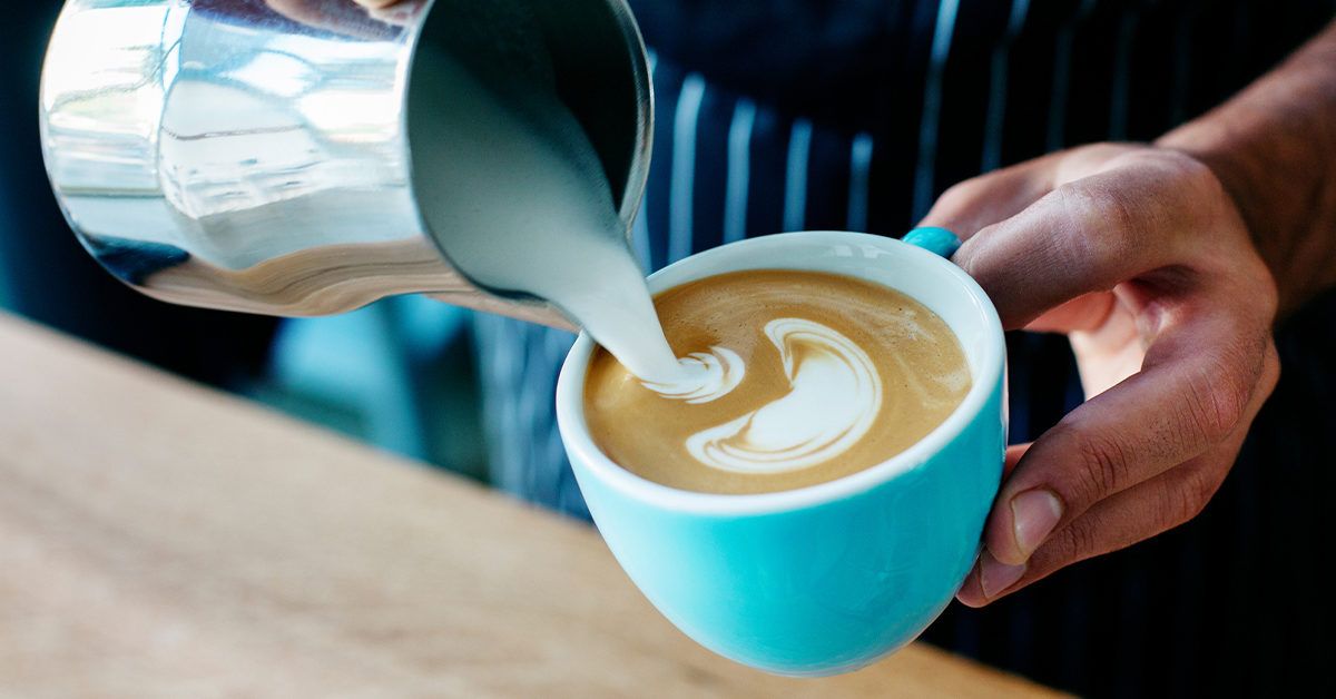 https://media.post.rvohealth.io/wp-content/uploads/2020/02/barista-pouring-coffee-cappuccino-latte-1200x628-facebook-1200x628.jpg
