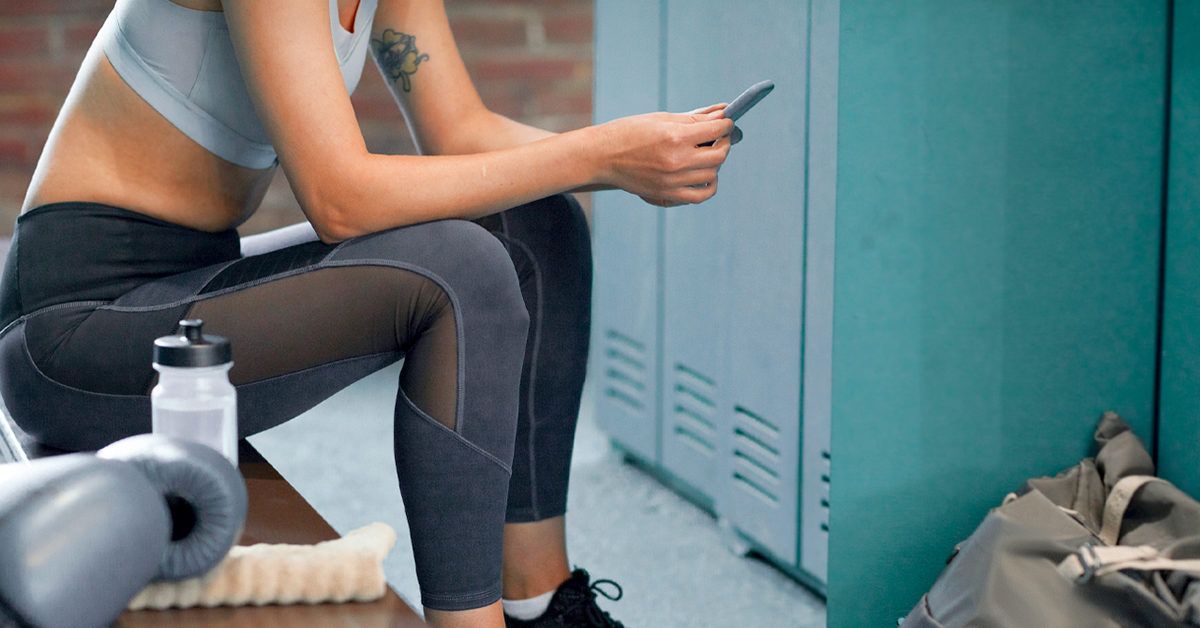 https://media.post.rvohealth.io/wp-content/uploads/2020/03/Unrecognizable-woman-in-sportswear-sitting-on-bench-in-gym-dressing-room-using-her-smartphone-1200x628-facebook-1200x628.jpg