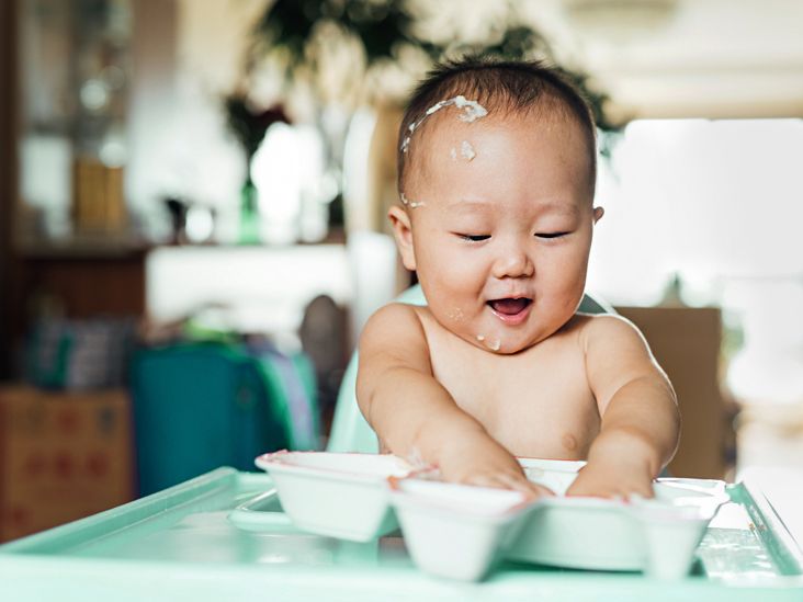 Baby eating rice cereal sales for the first time