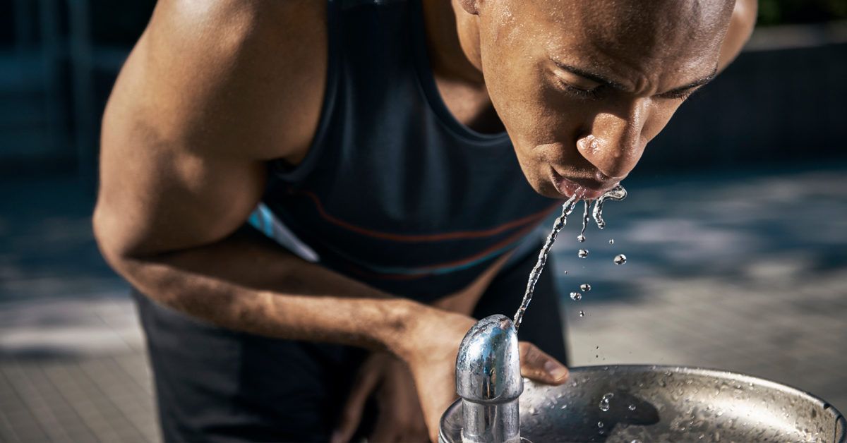 https://media.post.rvohealth.io/wp-content/uploads/2020/05/sweaty_person_drinking_water_from_fountain-1200x628-facebook-1200x628.jpg