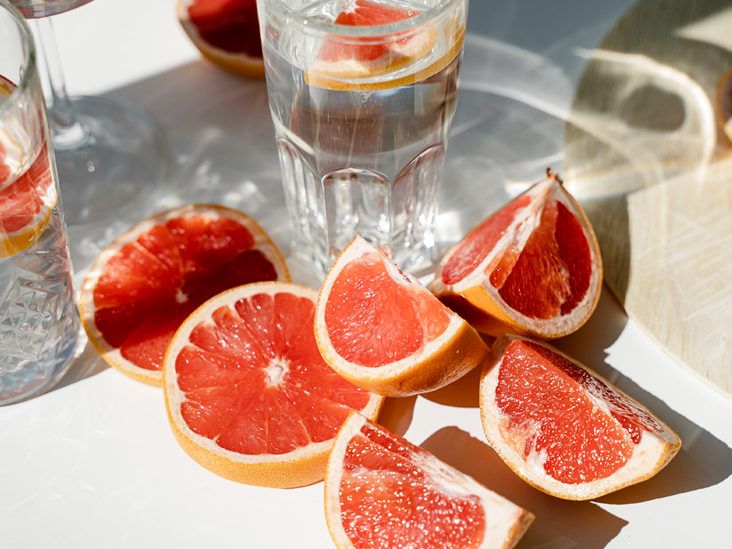 Discover the Health Benefits and Uses of Pink Grapefruit Stock Illustration  - Illustration of tabletop, juicy: 294445858
