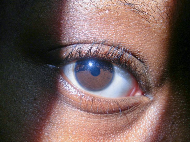 close up of black woman eye blinking loo... | Stock Video | Pond5