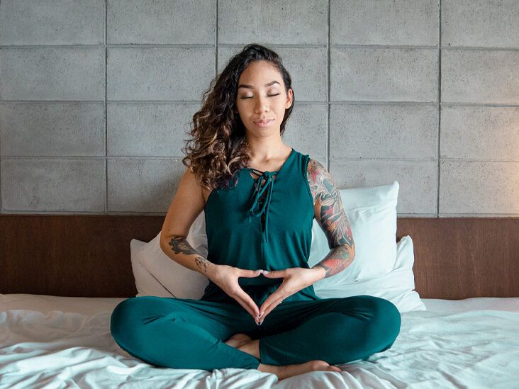 15-Minute Bed Yoga Routine to Help You Sleep