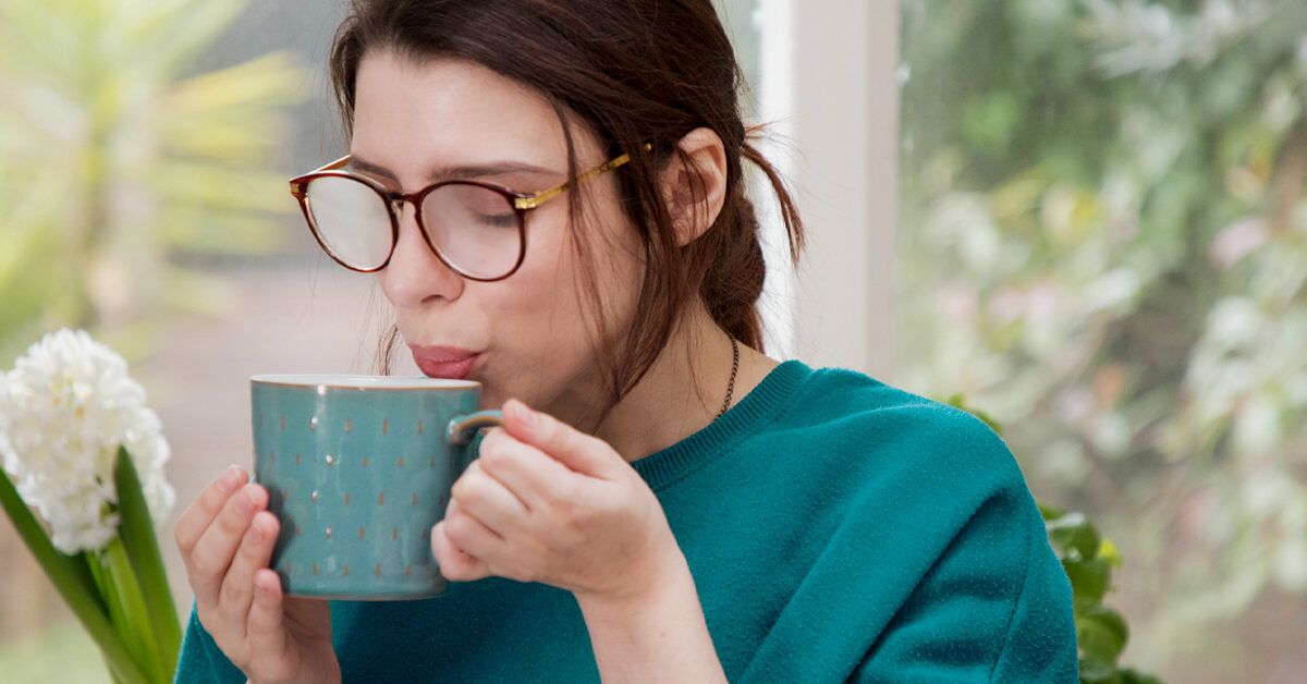 https://media.post.rvohealth.io/wp-content/uploads/2020/07/Woman-is-blowing-into-hot-drink-1200x628-facebook-1200x628.jpg