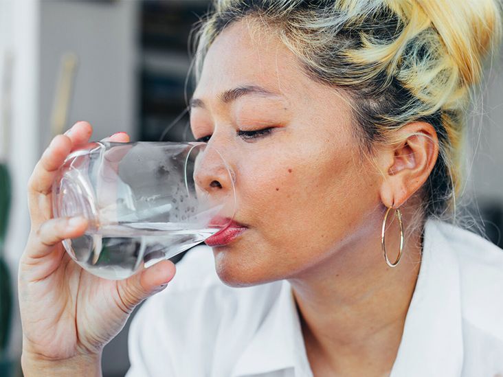 https://media.post.rvohealth.io/wp-content/uploads/2020/07/asian-woman-drinking-glass-water-732x549-thumbnail.jpg