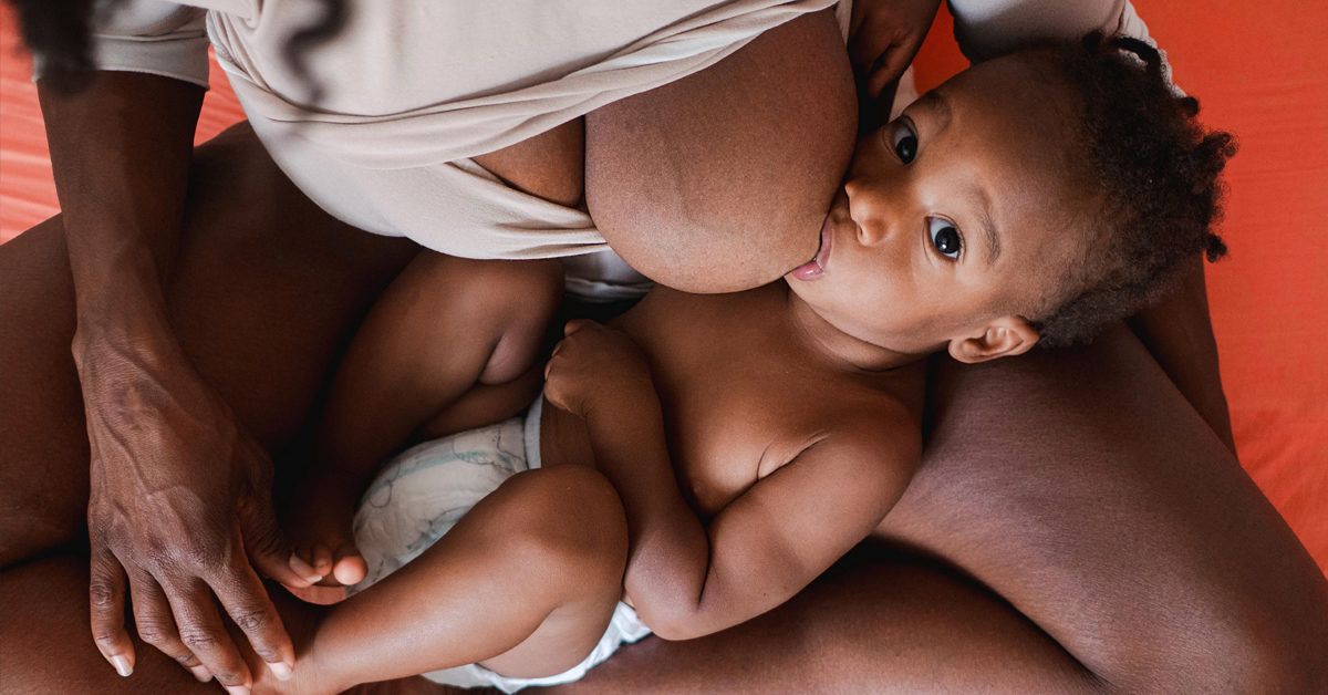 Breastfeeding with Big Boobs: Concerns, Holds, and Tips