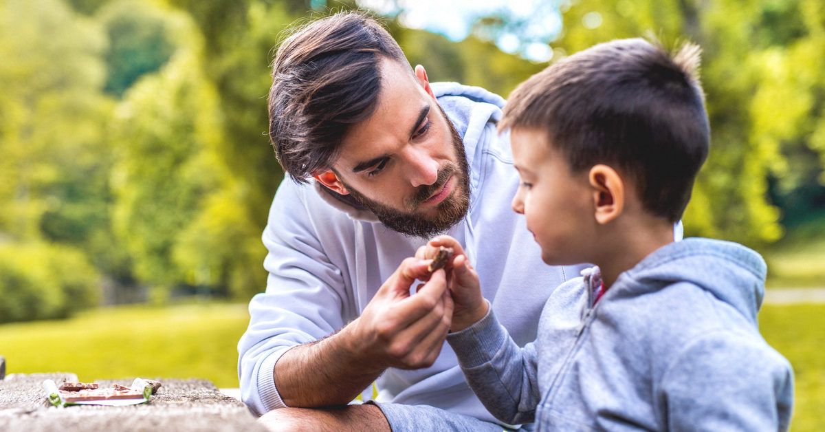 https://media.post.rvohealth.io/wp-content/uploads/2020/08/4666-father_and_son_eating_chocolate-1200x628-Facebook-1200x628.jpg