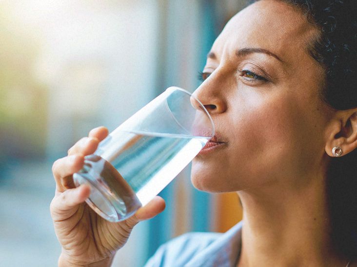 https://media.post.rvohealth.io/wp-content/uploads/2020/08/4878-Woman_drinking_a_glass_of_water-732x549-thumbnail-732x549.jpg