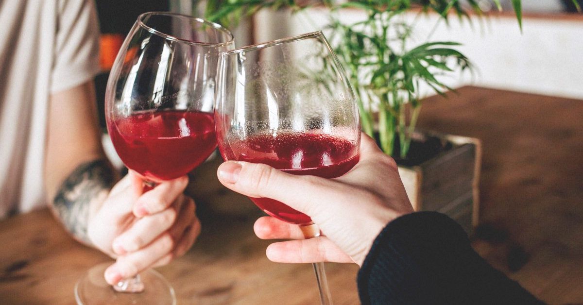 https://media.post.rvohealth.io/wp-content/uploads/2020/08/4978-Womans_holding_glass_with_red_wine-1200x628-Facebook-1200x628.jpg