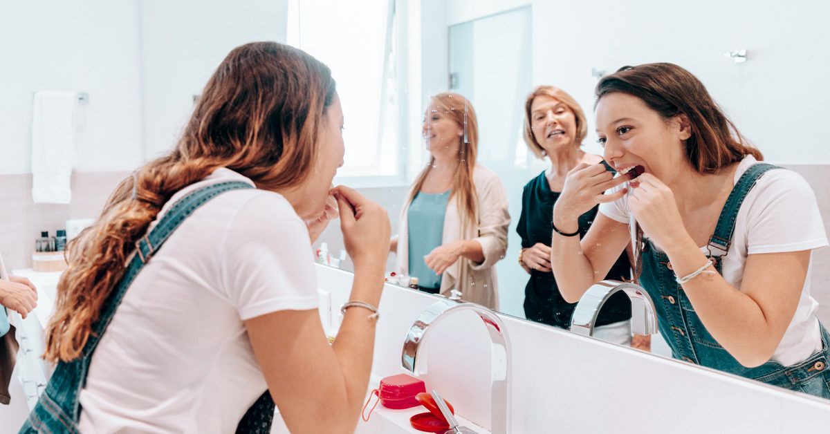 Waterpik vs. Flossing: Pros and Cons - Healthline