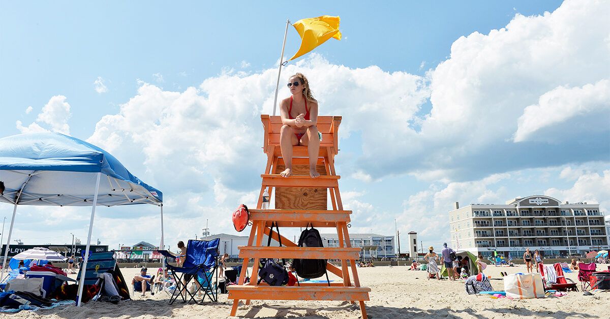 Funny Yellow Diving Boat with Lots of Flags of Different Countries