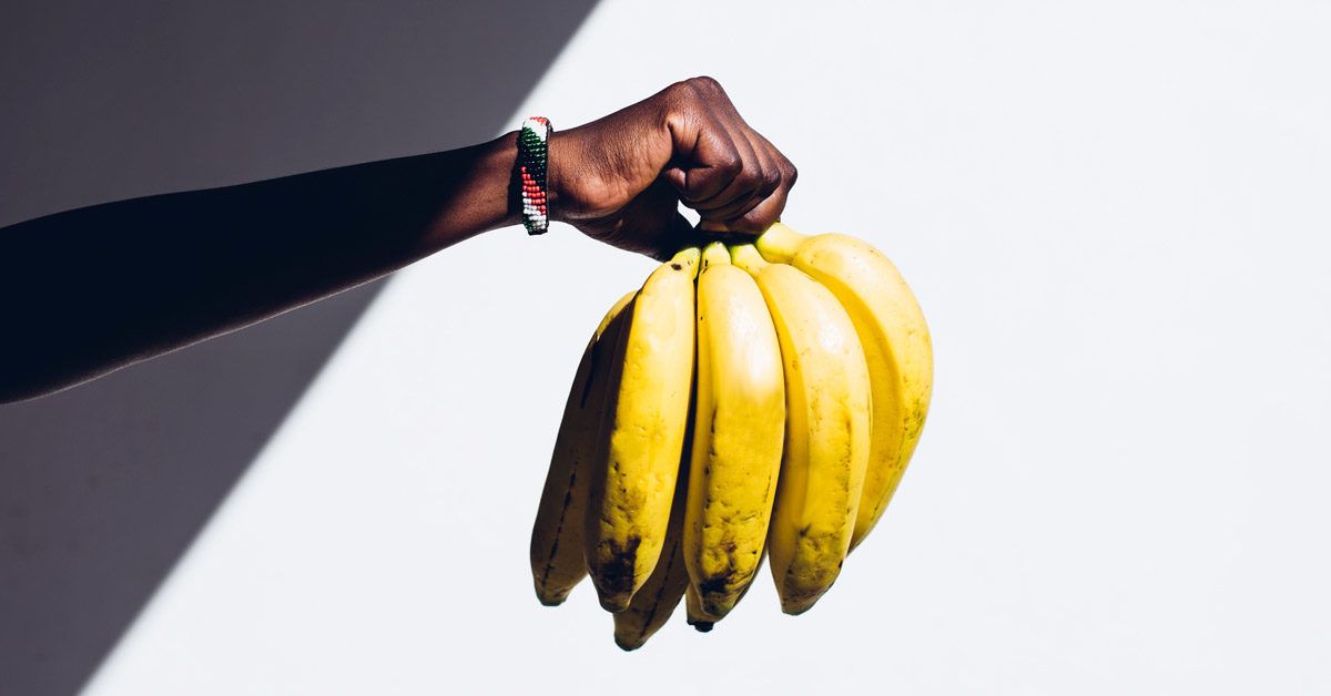 A person reaching for a bunch of bananas photo – Plantain Image on Unsplash
