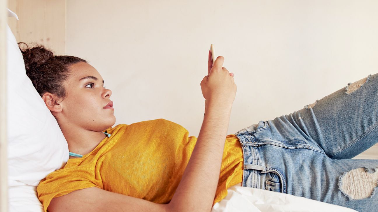 Woman scrolling on phone