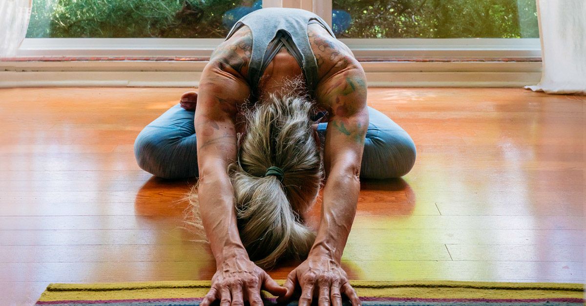 Smiling Man Woman Practicing Stretching Yoga Poses While Sitting Yoga Stock  Photo by ©AndrewLozovyi 285229508