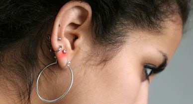 Pimple on the earlobe Treatments causes and prevention