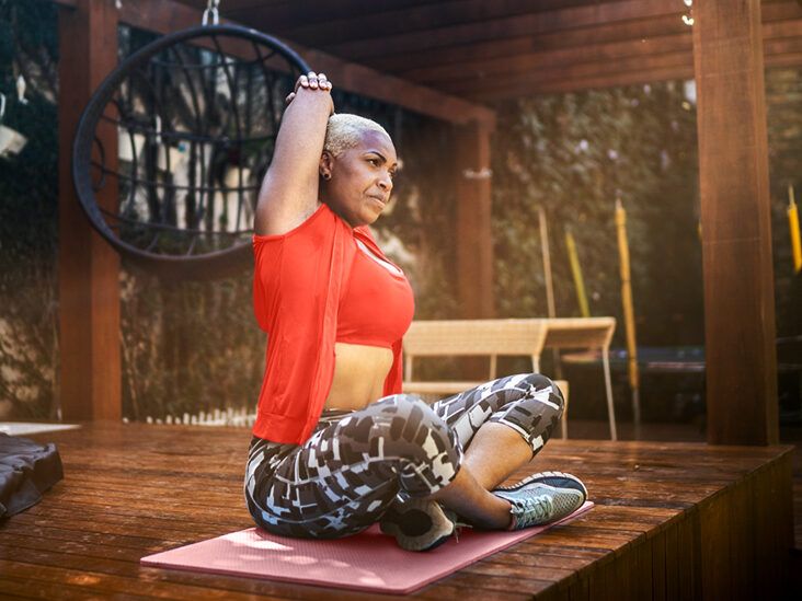https://media.post.rvohealth.io/wp-content/uploads/2020/09/Woman-stretching-her-arms-Pinched-Nerve-732x549-thumbnail-732x549.jpg