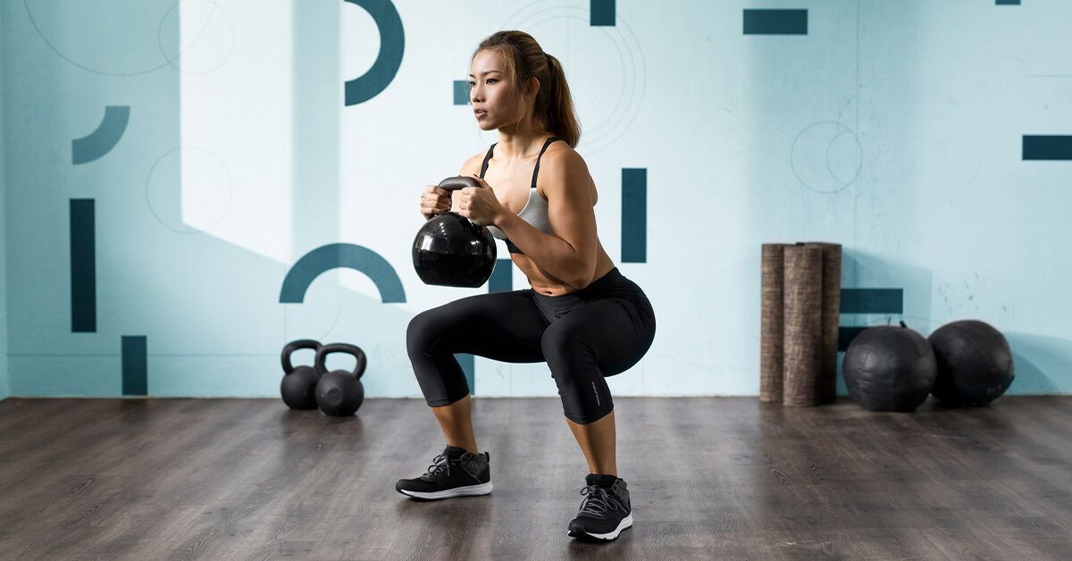 Resistance Band Squats 101: Boost Strength and Perfect Form