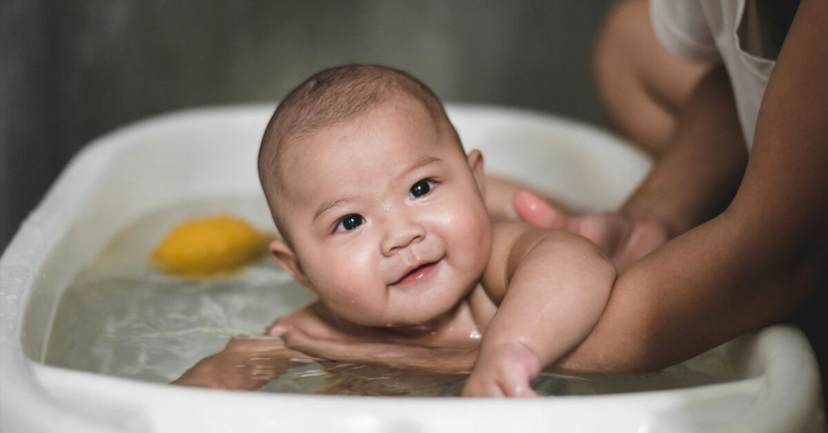 https://media.post.rvohealth.io/wp-content/uploads/2020/12/baby-bath-time-with-mom-1200x628-facebook-1200x628.jpg