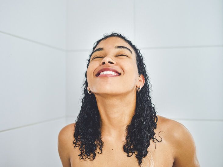 https://media.post.rvohealth.io/wp-content/uploads/2022/01/woman_with_curly_hair_in_the_shower-732x549-thumbnail-732x549.jpg