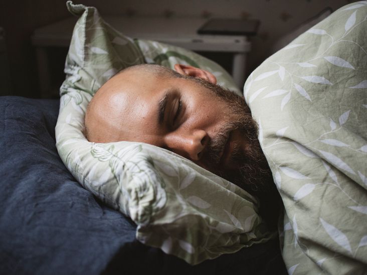 https://media.post.rvohealth.io/wp-content/uploads/2022/02/man_sleeping_on_side-732x549-thumbnail.jpg