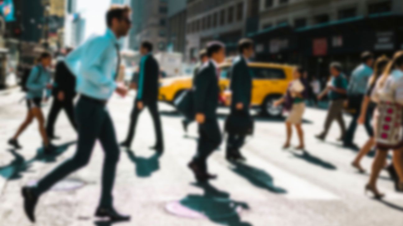 blurry view of people on street