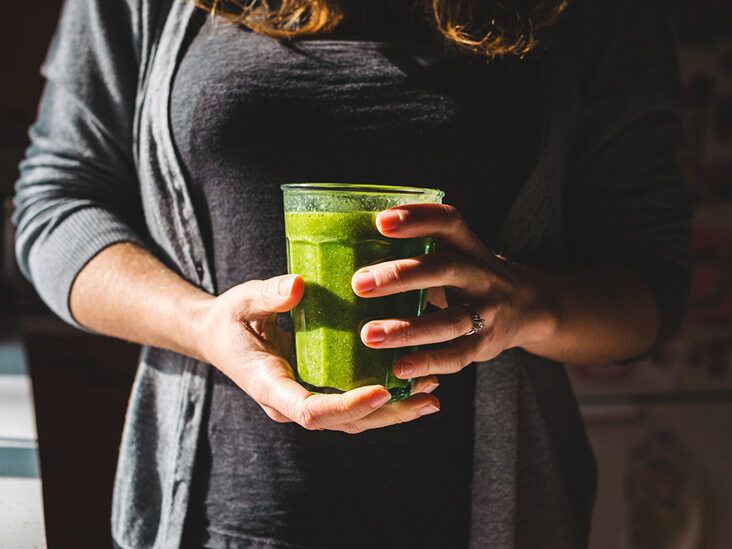 https://media.post.rvohealth.io/wp-content/uploads/2022/05/mature-female-holding-green-smoothie-732-549-feature-thumb-732x549.jpg