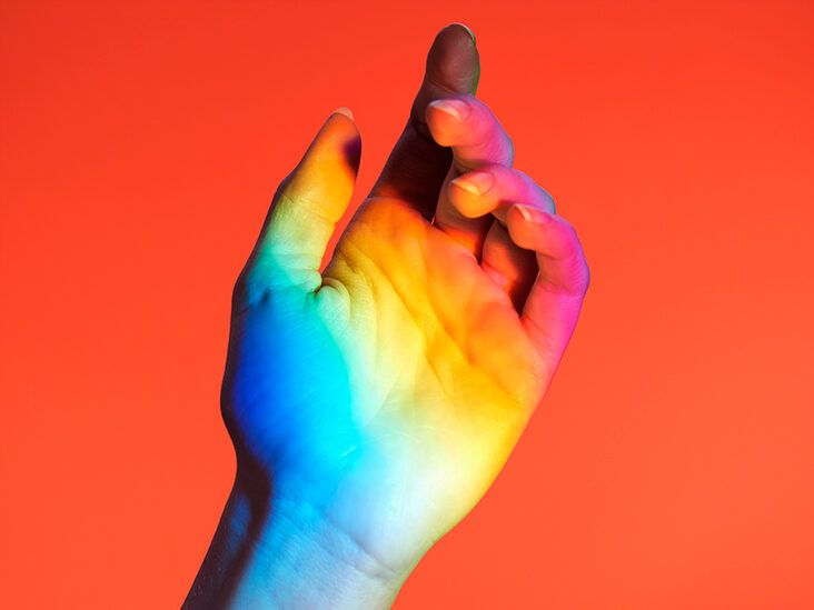 https://media.post.rvohealth.io/wp-content/uploads/2022/09/hand-with-rainbow-colors-red-background-732x549-thumbnail-732x549.jpg