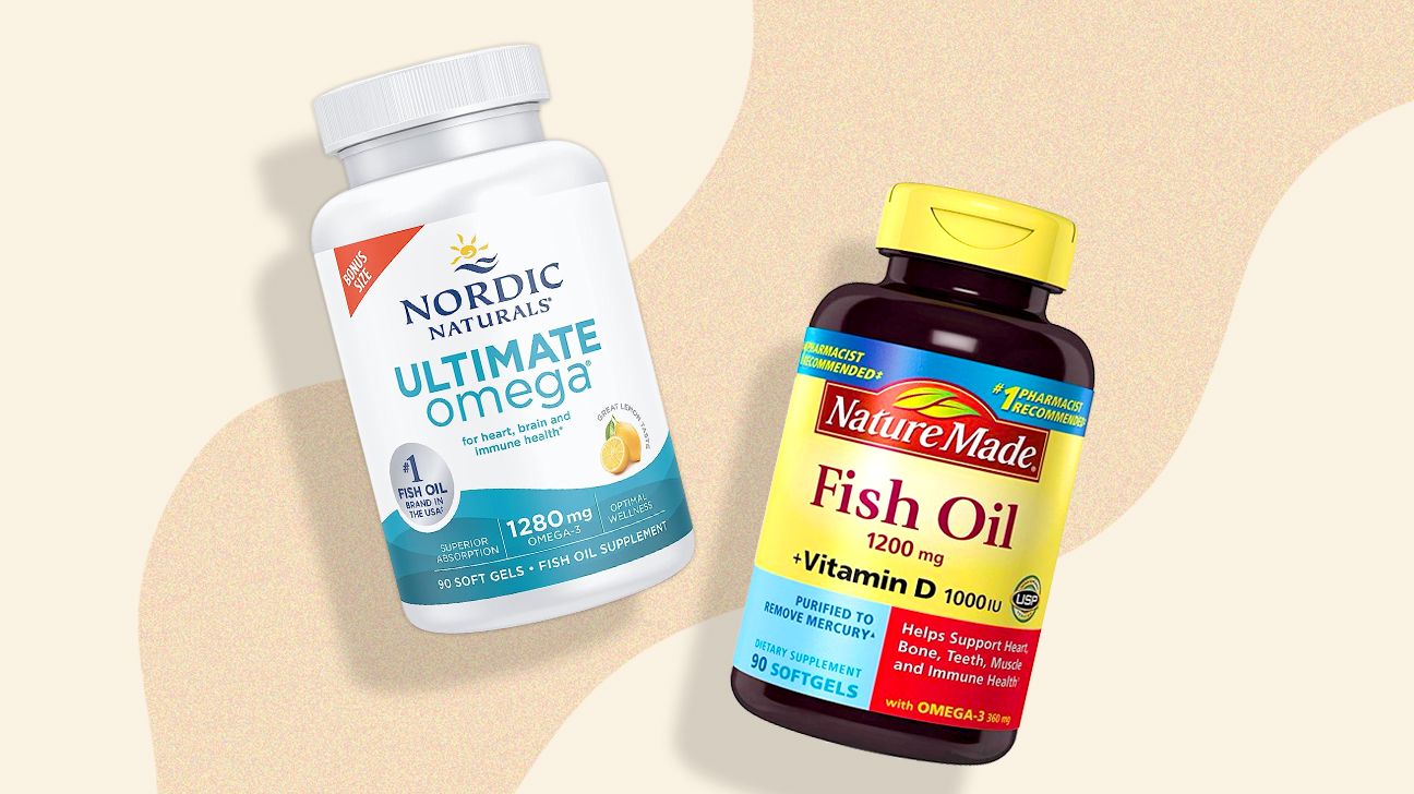two fish oil supplements by Nordic Naturals and NatureMade on an orange background