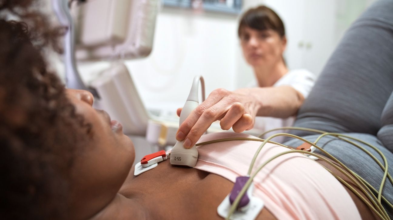 A woman undergoes an EKG test.