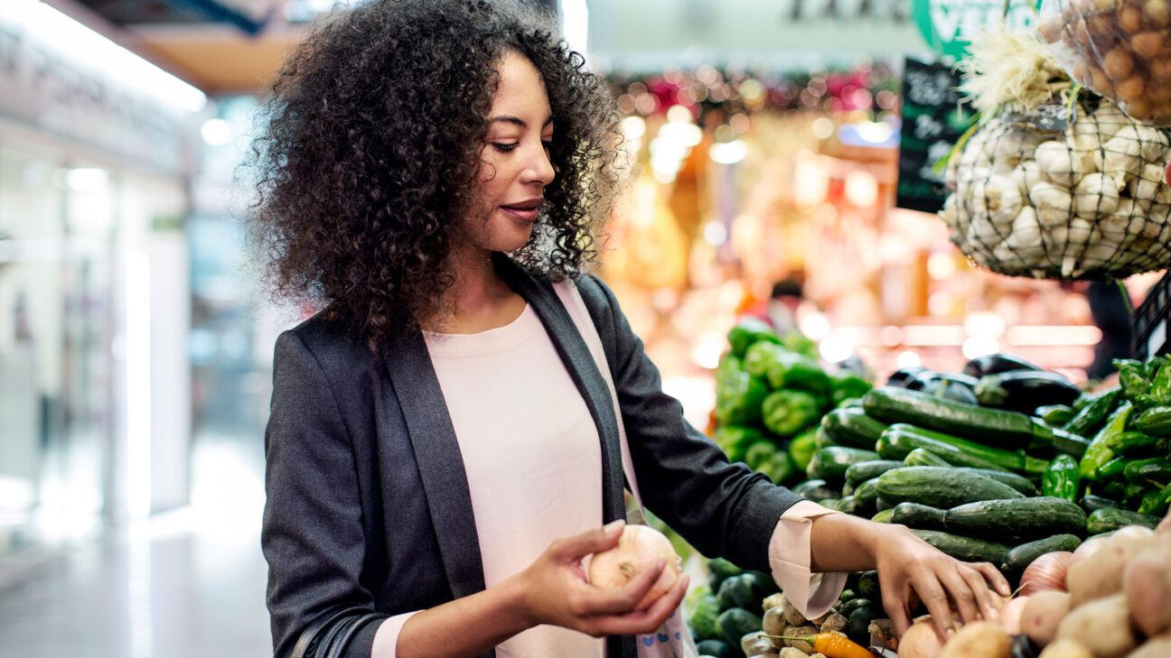 A woman shopping for produce.