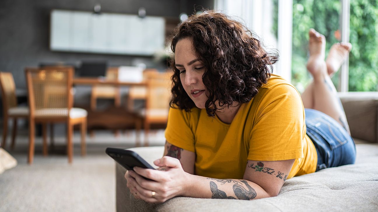 woman browsing on mobile phone