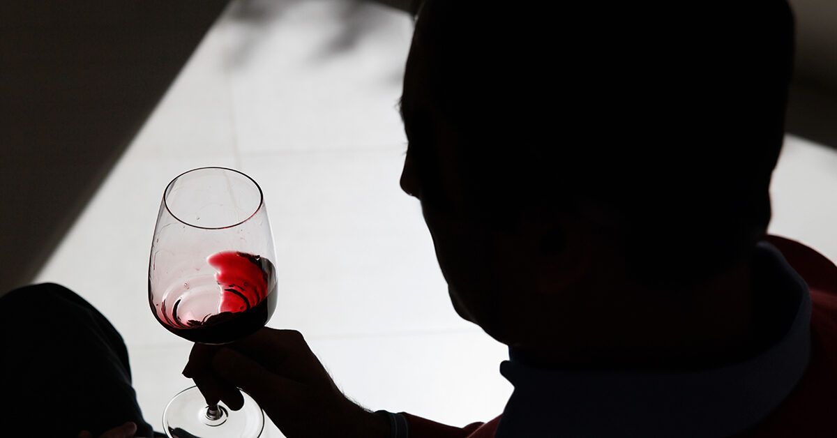 https://media.post.rvohealth.io/wp-content/uploads/2023/08/man-silhouette-holding-glass-of-red-wine-shadow-1200x628-facebook-1200x628.jpg