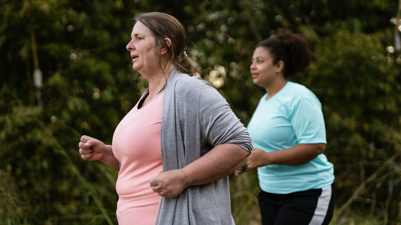 Two women exercising.