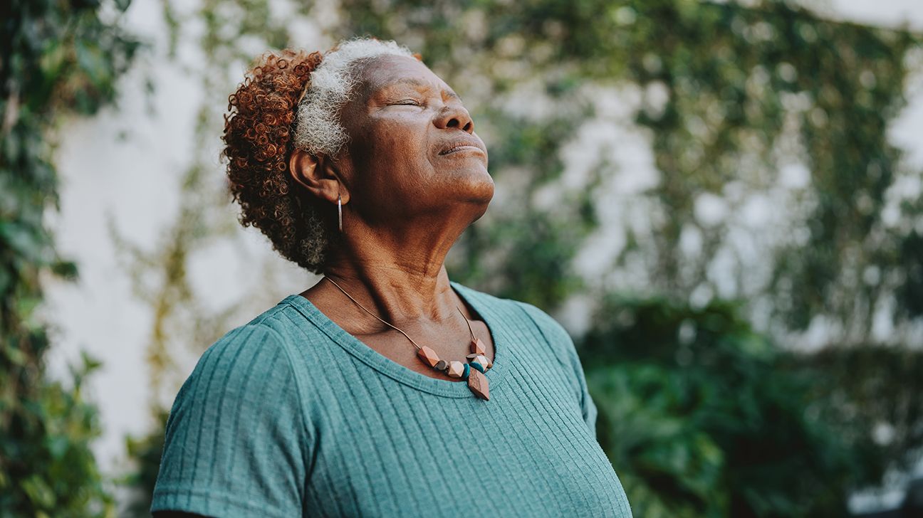 older person outside in the sun getting vitamin D