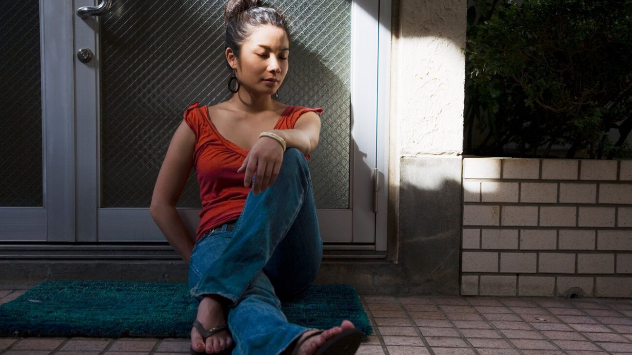 person with focal epilepsy sitting outside in the sun