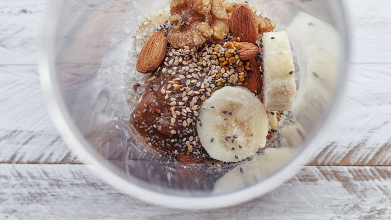 Flaxseeds top a dish that includes bananas.