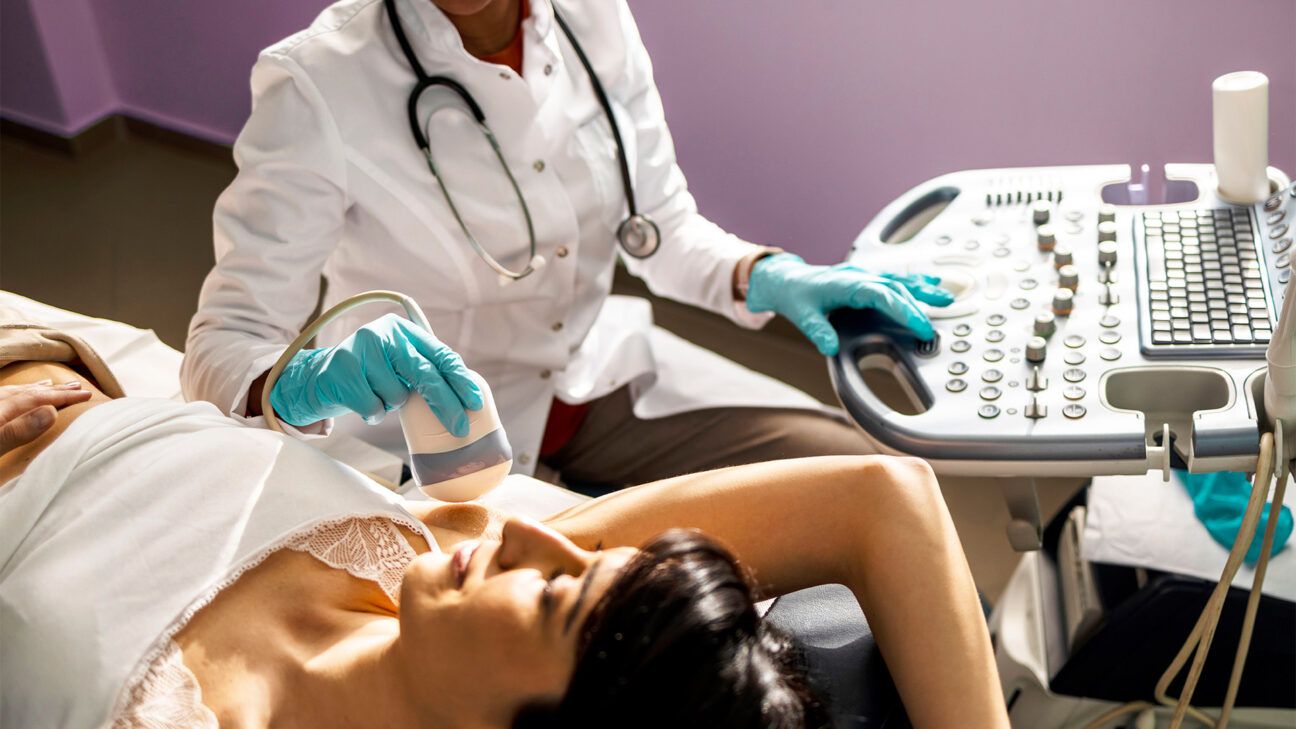 A woman getting a breast ultrasound.
