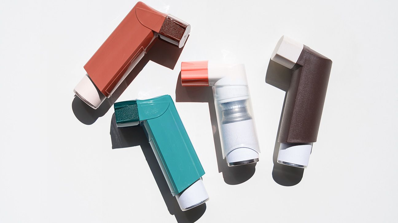 An assortment of inhalers, each a different color.