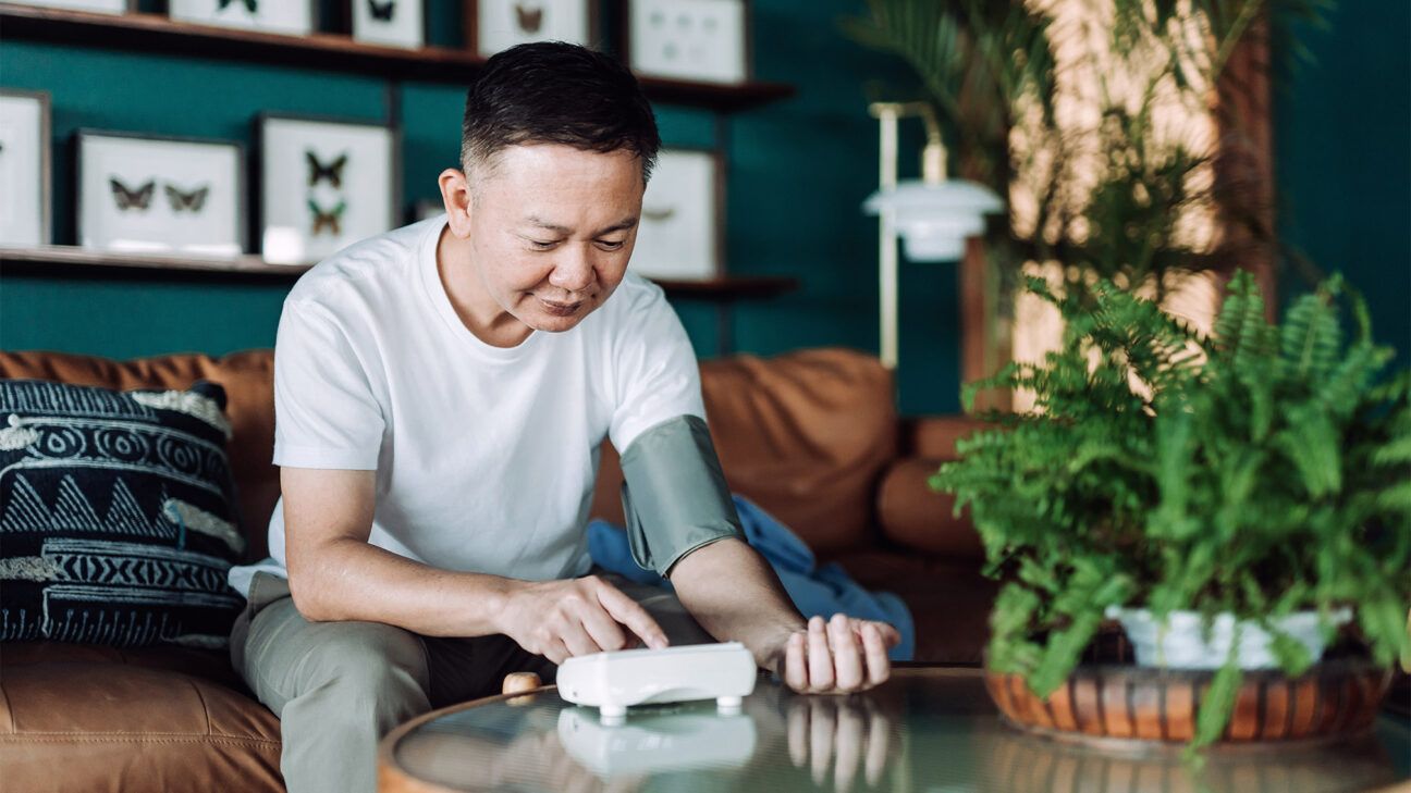 Man checking blood pressure.