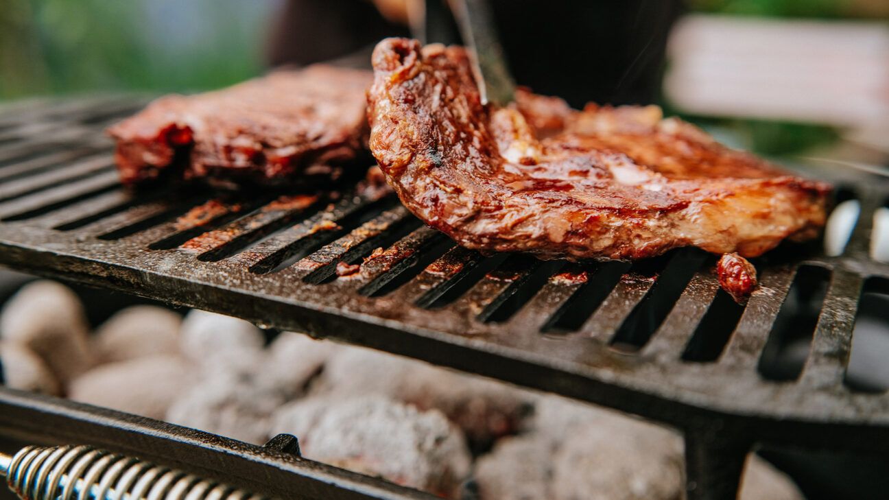 Beef steak on a grill.