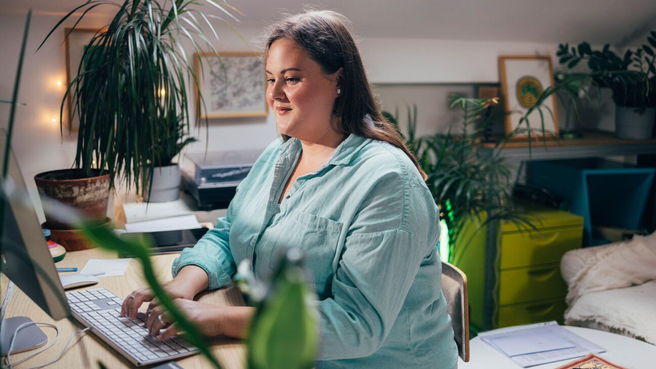 A female using a laptop computer.