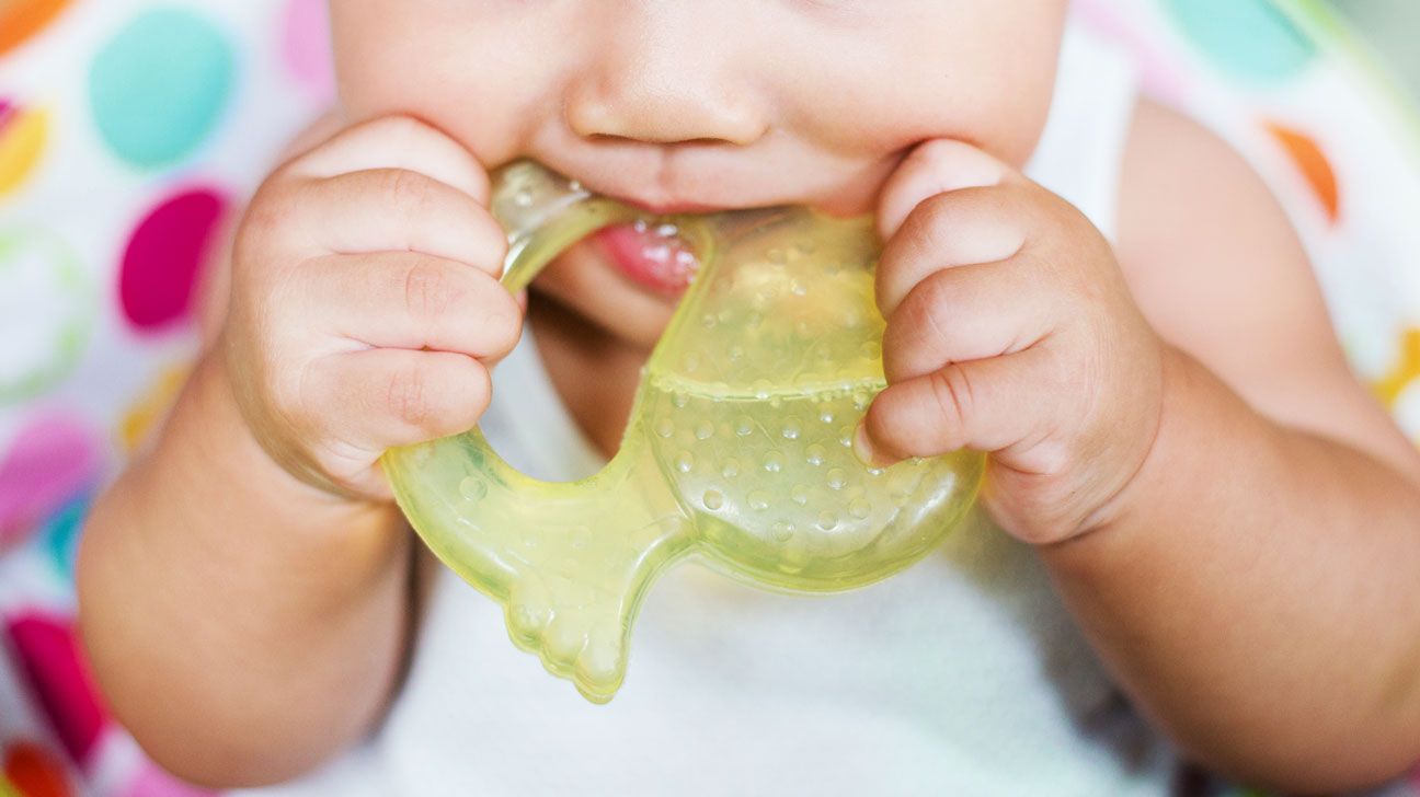 baby chewing on a teething ring-1