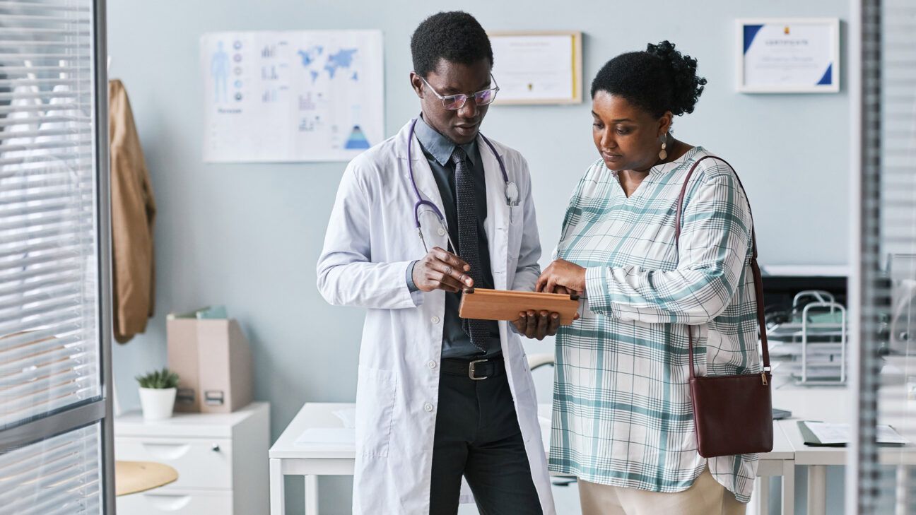 Doctor talking with a patient.