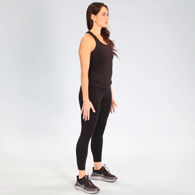 female performing bodyweight squat