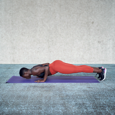 female performing pushup